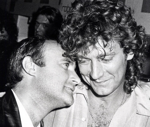 Musicians Phil Collins and Robert Plant attend Phil Collins Tour Party on September 12, 1983 at Be Bop Cafe in New York City. (Photo by Ron Galella/WireImage)